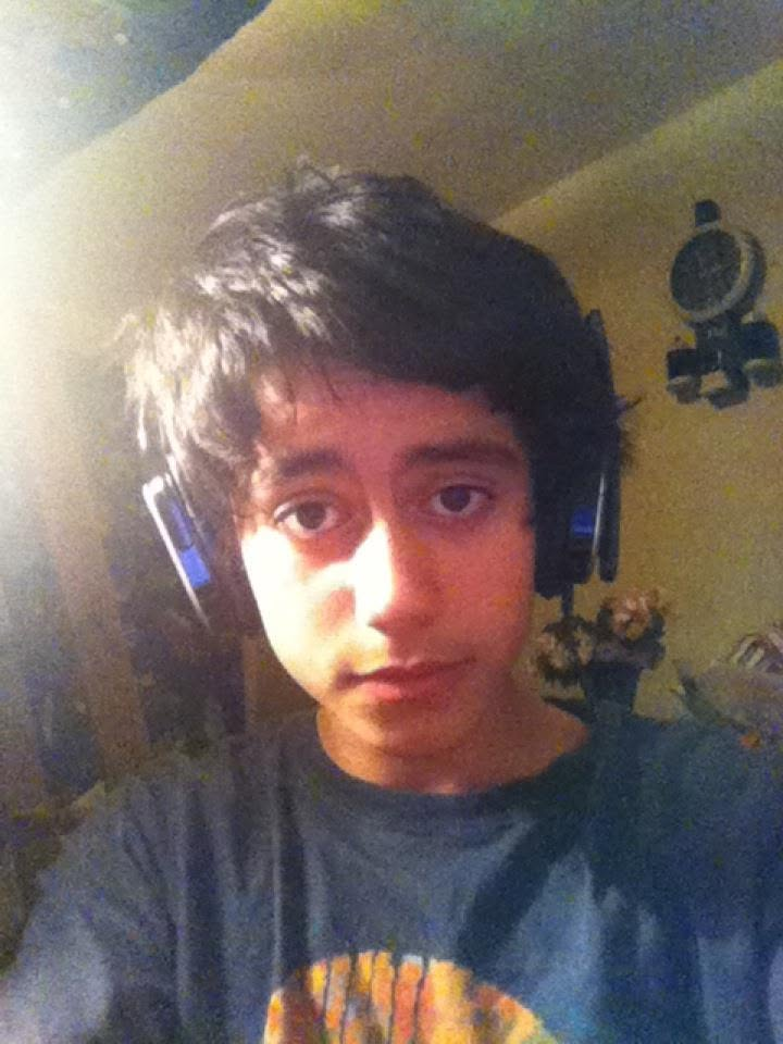 Me in 2011, teenage gamer with headphones